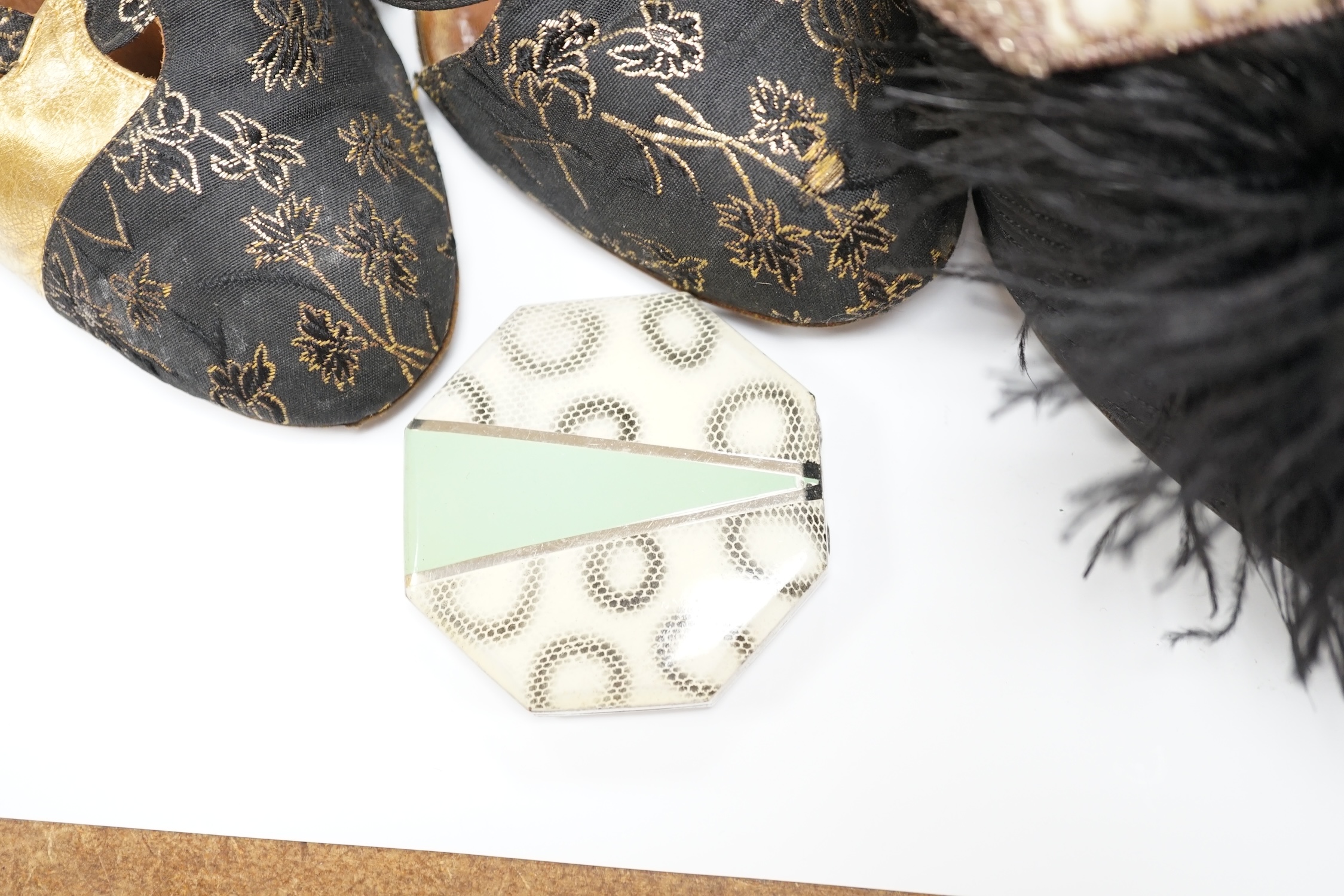 A pair of ladies black feather decorated 1940’s evening shoes, a similar gold leather and brocade pair of shoes, with a collection of bead bags, compacts, etc.